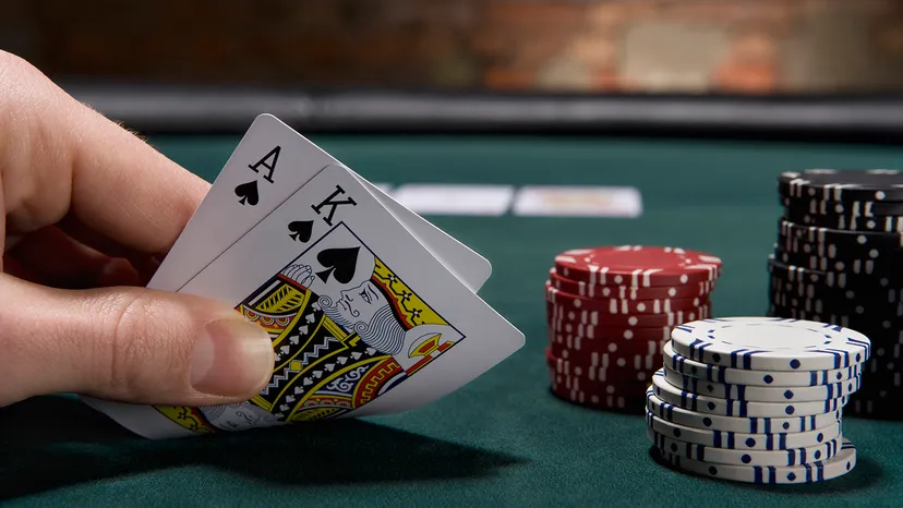 Blackjack table with few chips and cards